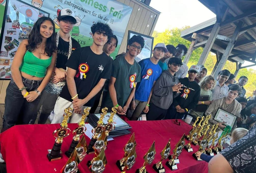 Award ceremony at the BASK Children's Business Fair with young entrepreneurs receiving prizes