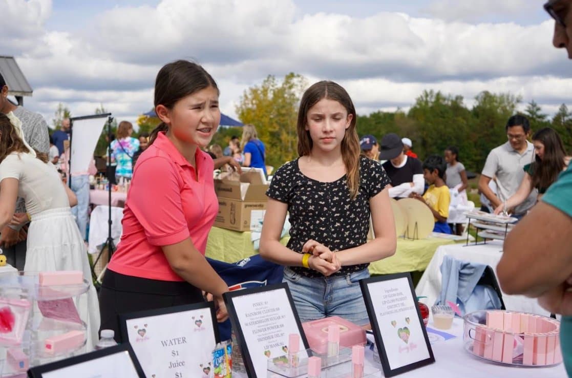 Crowd of families and young entrepreneurs at the BASK Fair